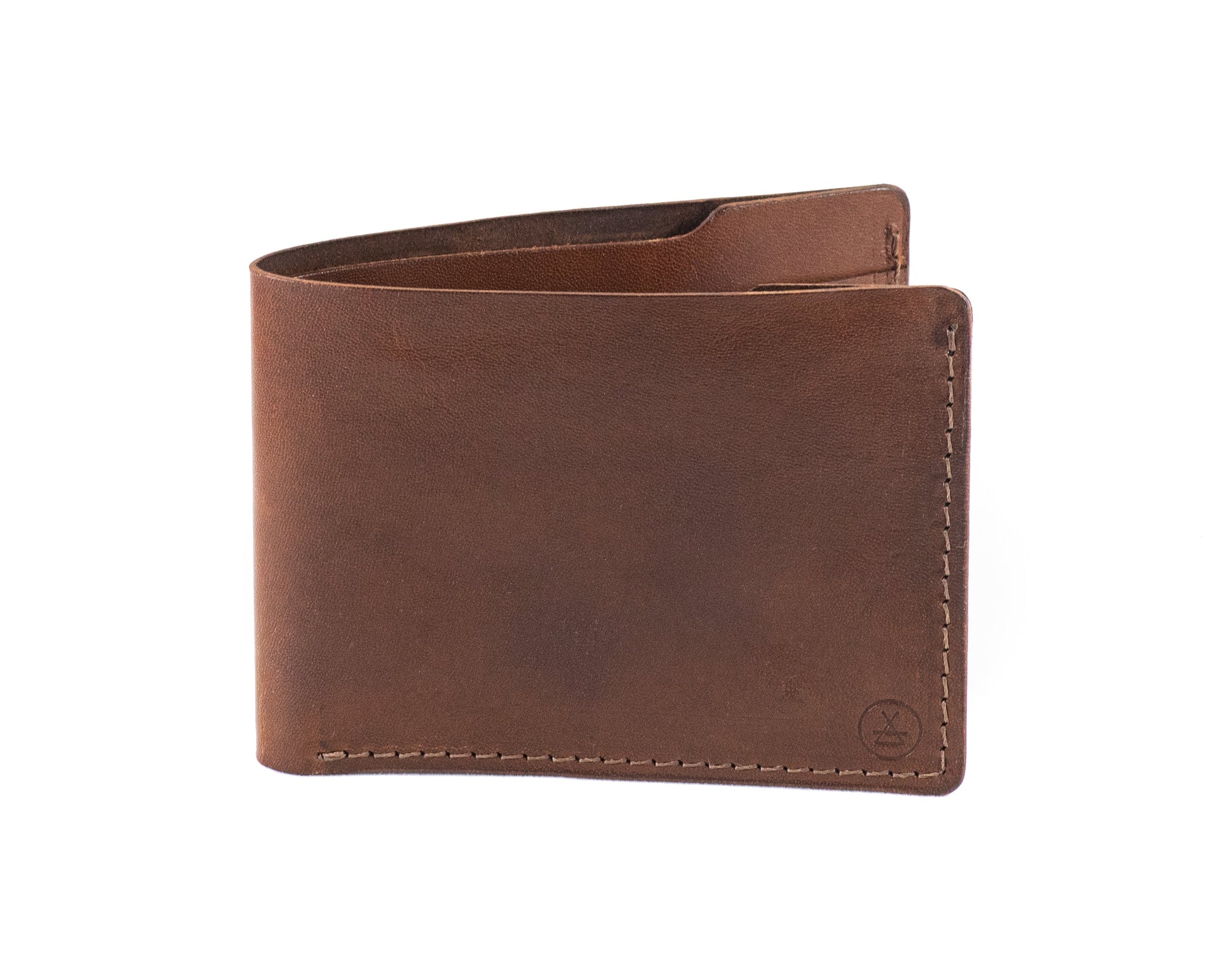 Classic horizontal bifold slim wallet in whiskey | Kohutt's interpretation of the classic leather bifold wallet is a slim and stylish accessory made in Australia from whiskey coloured veg-tan leather. This wallet can | Classic horizontal bifold slim wallet - Kohutt™ | Borne of the Sea