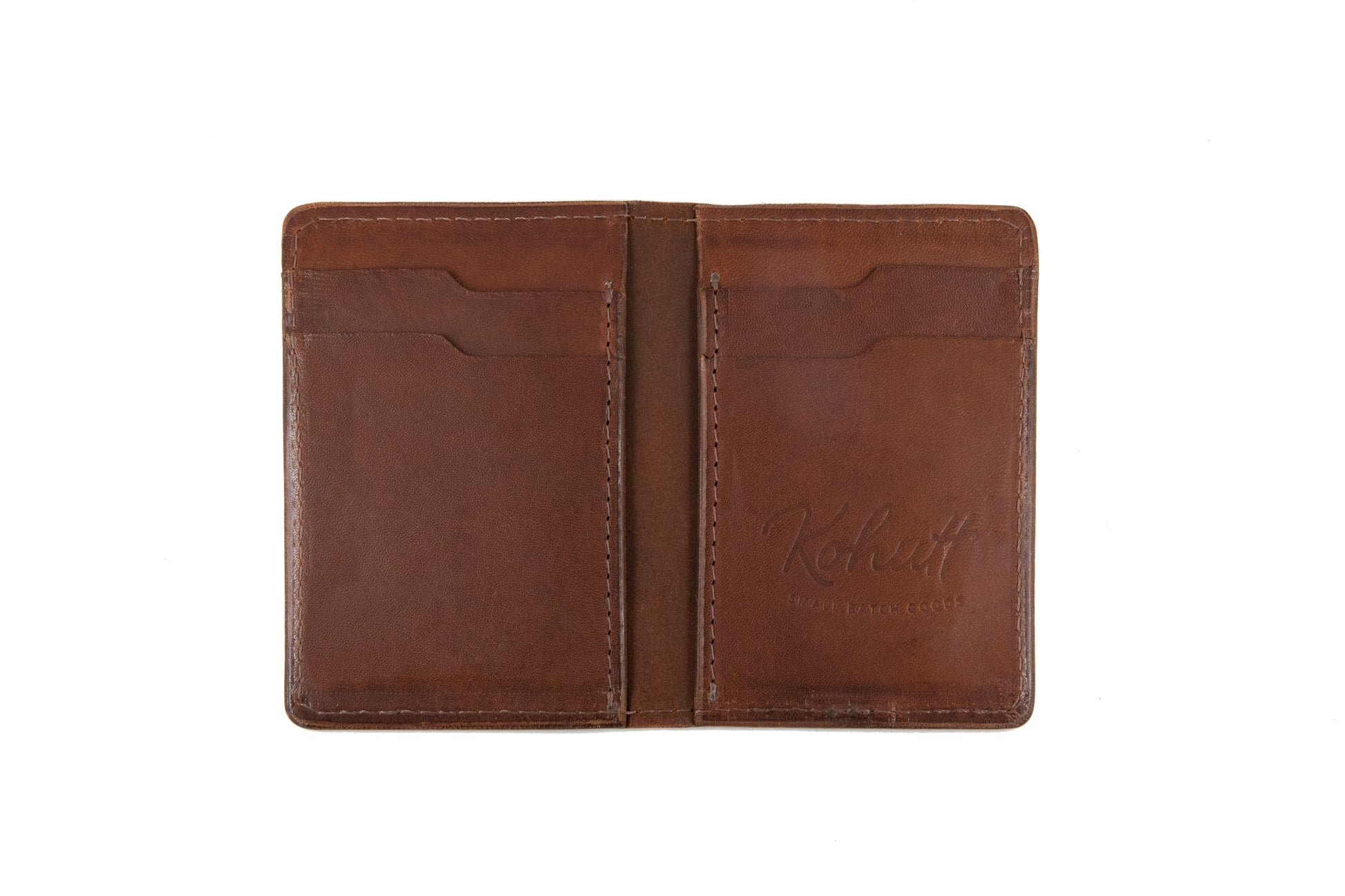 Classic vertical bifold slim wallet in whiskey | 
The Kohutt classic leather vertical bifold wallet - slim in design and made in Australia from whiskey coloured veg tan leather. Suitable for Australian, U.S &amp; E | Classic vertical bifold slim wallet - Kohutt™ | Borne of the Sea