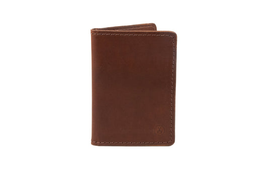 Classic vertical bifold slim wallet in whiskey | 
The Kohutt classic leather vertical bifold wallet - slim in design and made in Australia from whiskey coloured veg tan leather. Suitable for Australian, U.S &amp; E | Classic vertical bifold slim wallet - Kohutt™ | Borne of the Sea